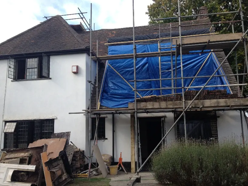 Scaffold and stripped roof
