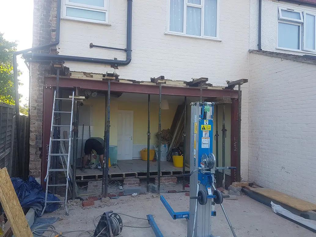 The rear wall comes out