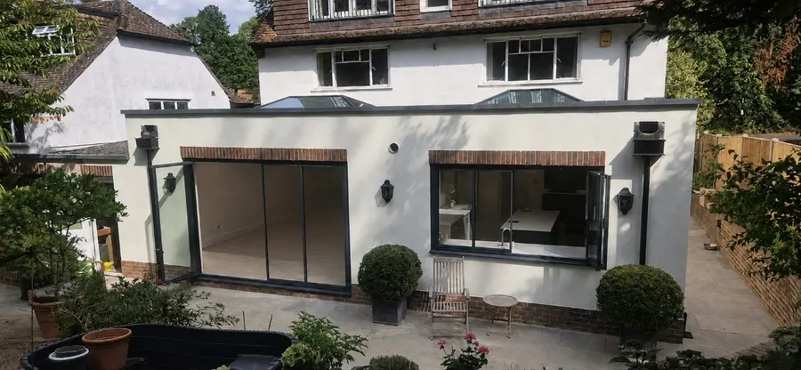 Welcomes Road: Rear extension, entrance porch, retaining wall and paving